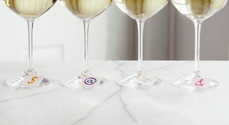 DIY Stitched Paper Wine Charms On Wine Glasses By Design Fixation