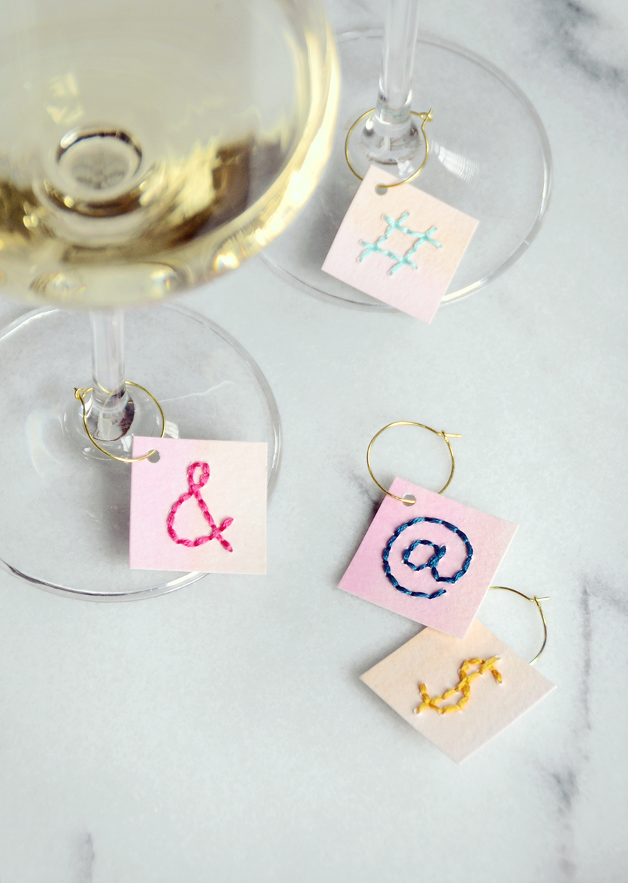 DIY Stitched Paper Wine Charms On Wine Glasses By Design Fixation