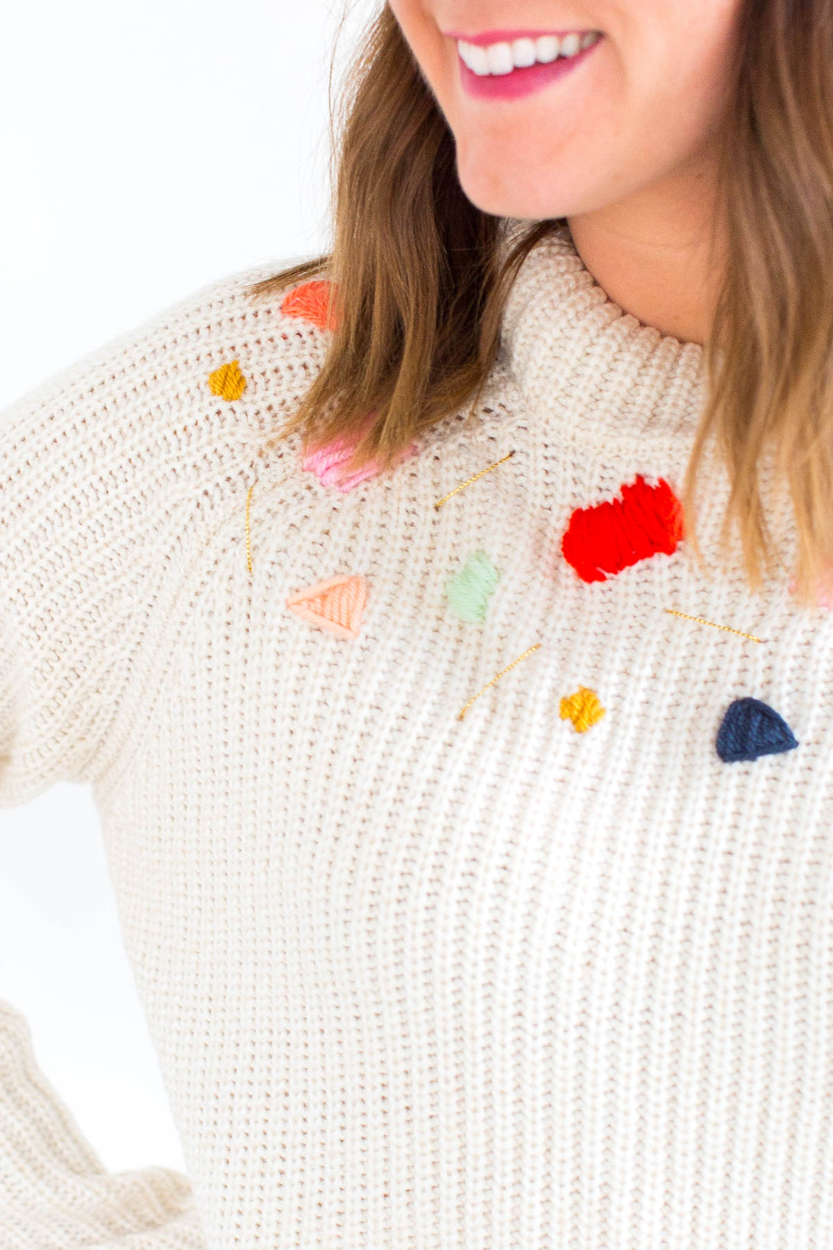 Embroidered Sweater /// 10 Colorful DIY Projects To Usher In Spring by Design Fixation