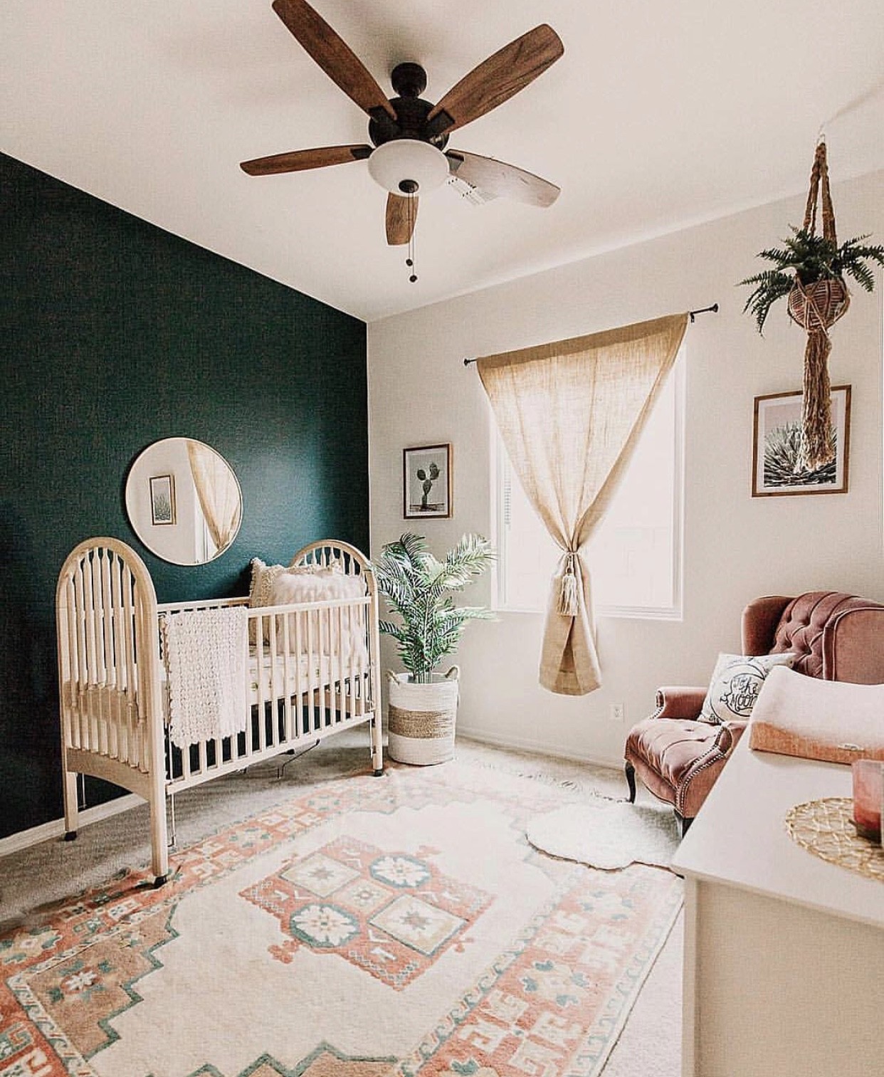 Green accent wall store nursery