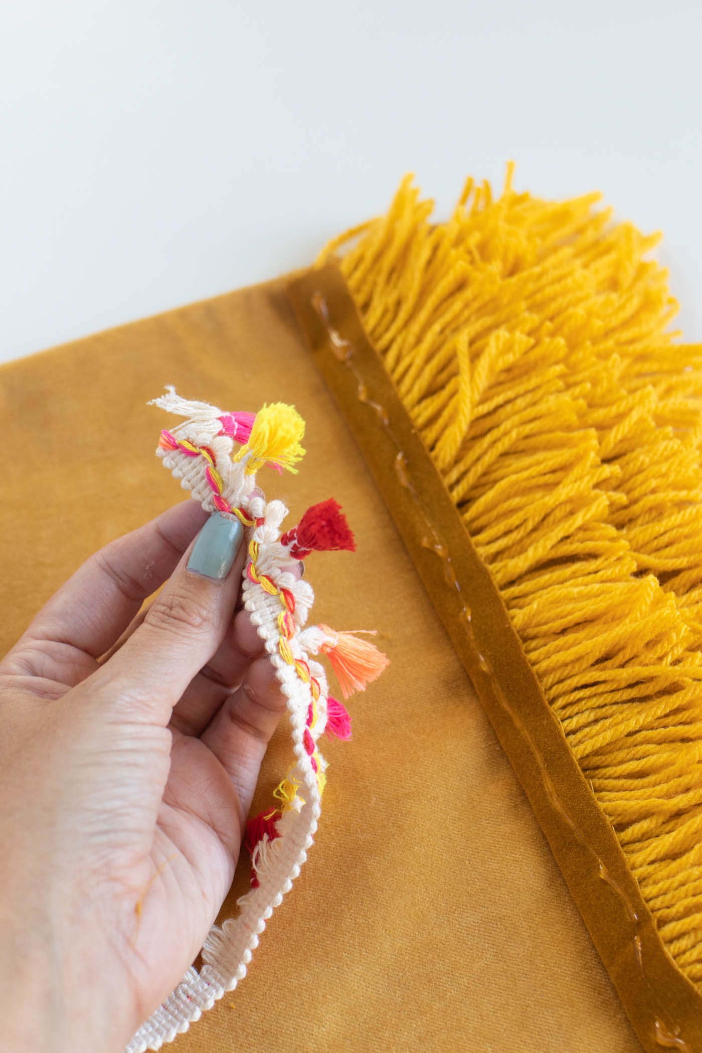 DIY No-Sew Boho Fringe Pillow /// Tutorial by Club Crafted for Design Fixation #colorful #fabric #tassels