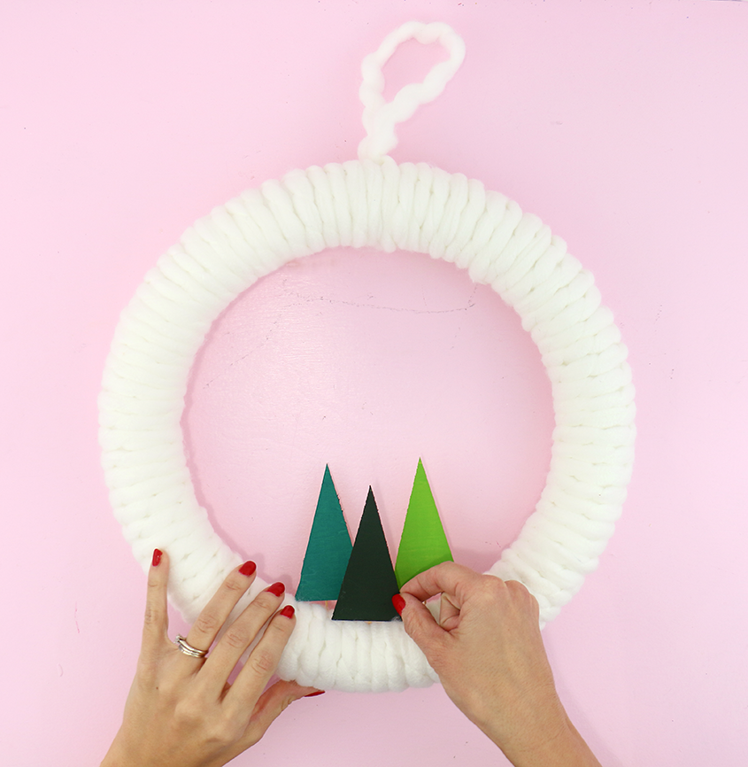 Simple DIY Winter Yarn Wreath /// A guest post by Meghan Quinones of Happiness Is Creating for Design Fixation #wreath #winter #trees #modern