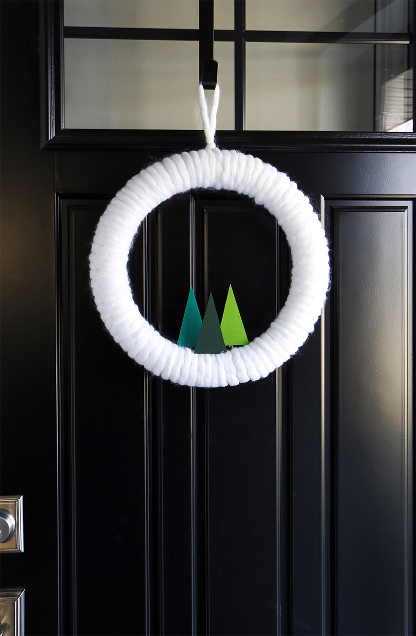 Simple DIY Winter Yarn Wreath /// A guest post by Meghan Quinones of Happiness Is Creating for Design Fixation #wreath #winter #trees #modern