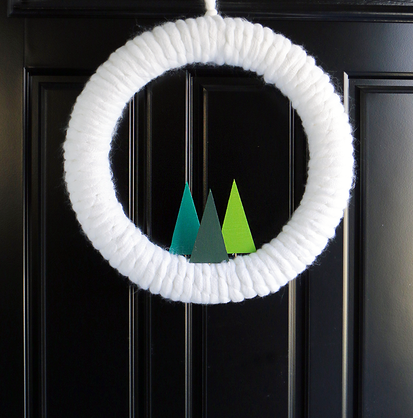 Simple DIY Winter Yarn Wreath /// A guest post by Meghan Quinones of Happiness Is Creating for Design Fixation #wreath #winter #trees #modern