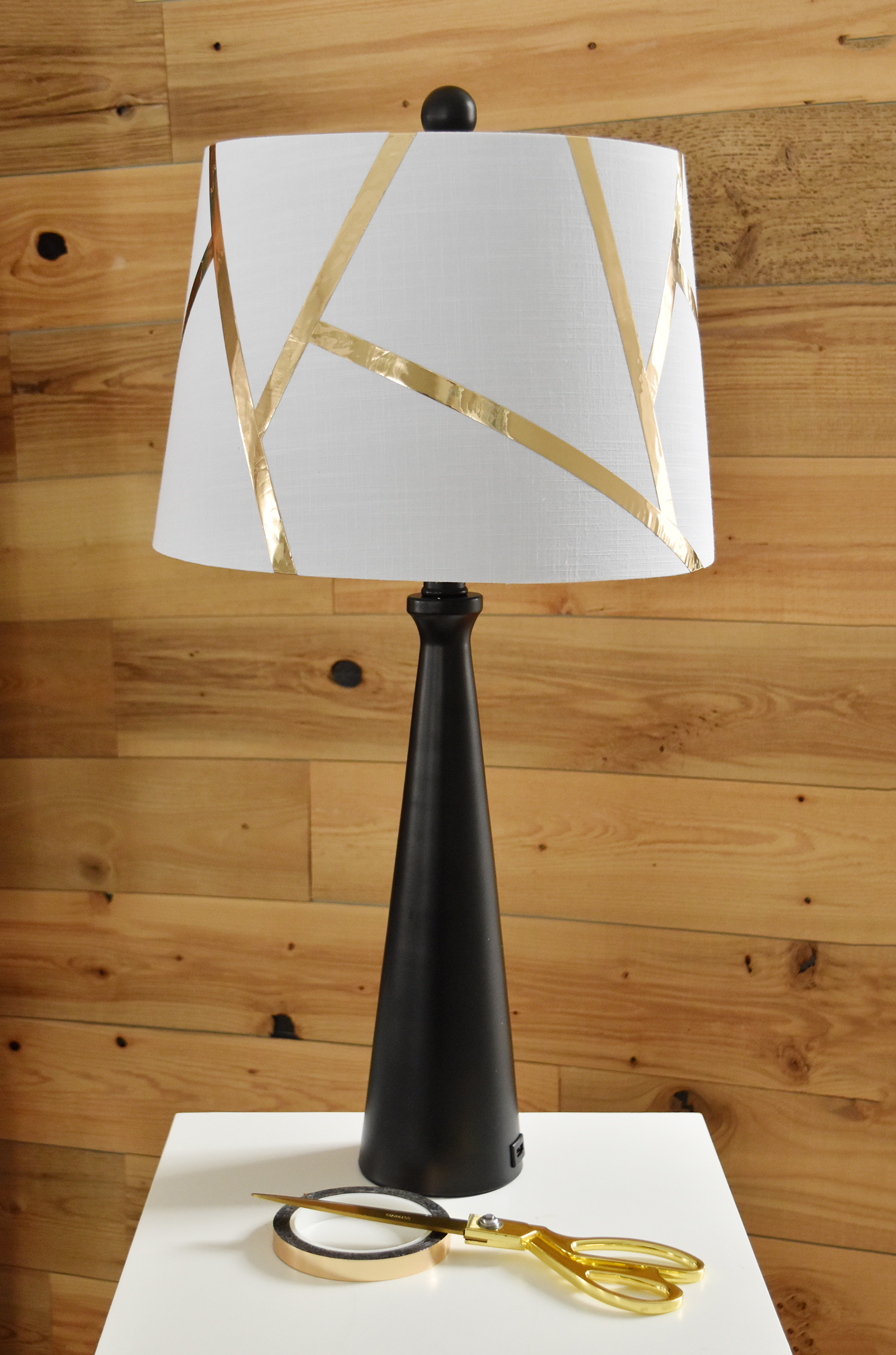 Easy DIY Geometric Lamp Shade /// By Design Fixation #gold #tape #metallic #home_decor