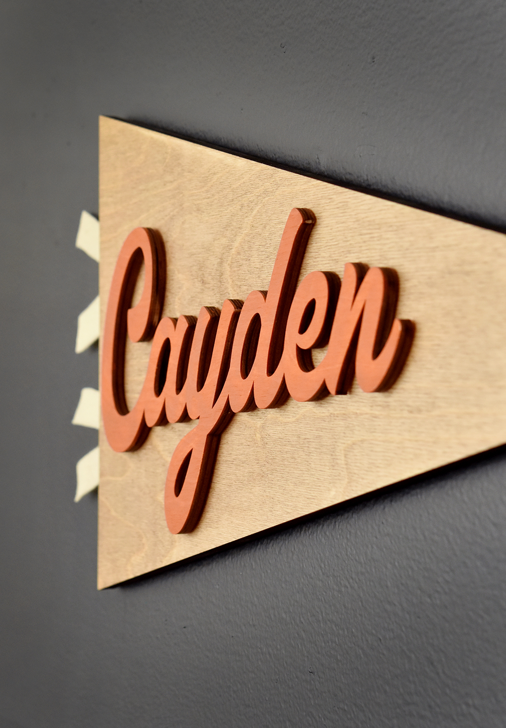 DIY Wood Pennant Name Sign /// By Design Fixation #home #decor #diy #wood #name #flag